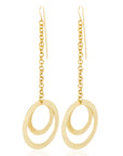 Handcrafted Akili Earrings by Adele Dejak, featuring interlocking circular brass pendants suspended from delicate chain drops; inspired by African heritage, these lightweight, 18.3cm-long statement pieces exude contemporary elegance and timeless sophistication- front view