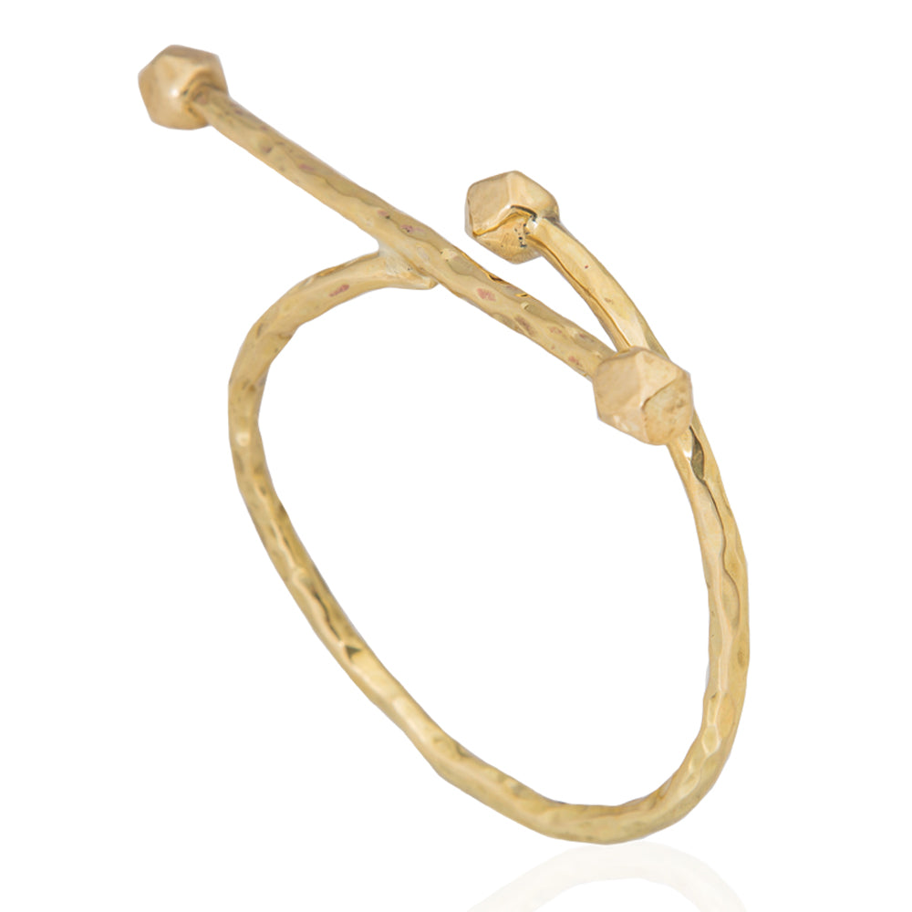 Adele Dejak AVI Bracelet – Handcrafted brass cuff bracelet with a sleek, minimalist design, available in 24K gold-plated and brass finishes. Celebrating African heritage and sustainable craftsmanship, this artisan-made piece offers timeless elegance and versatility, perfect for stacking or solo wear-side view