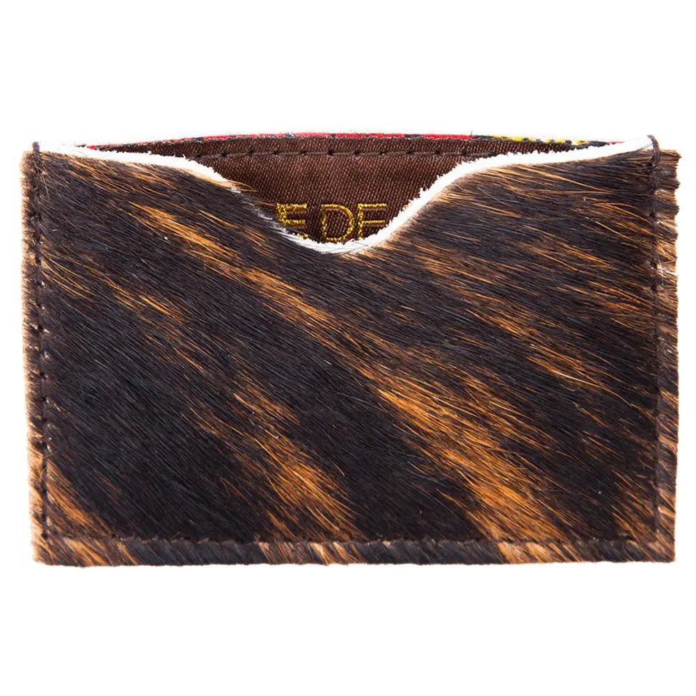 Stylish leather cowhide card holder, compact & durable, rustic charm, ethically sourced, perfect for everyday elegance-diagonal view