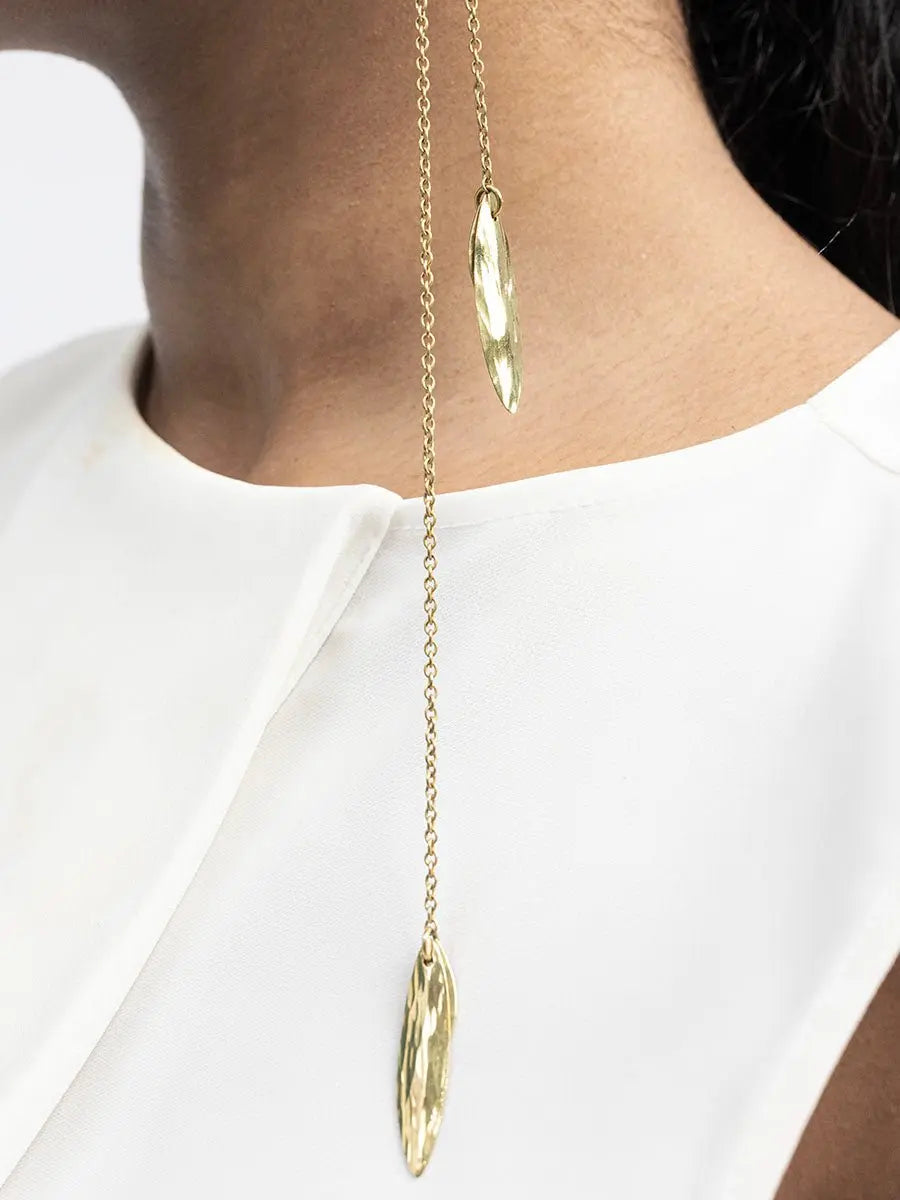 Jana Ear Cuff: sleek, contemporary ear accessory with delicate chain, radiating charm and modern allure-side profile view