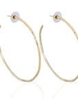 Jojo Earrings: minimalist brass elegance, artisan-crafted for serene, refined style-front view