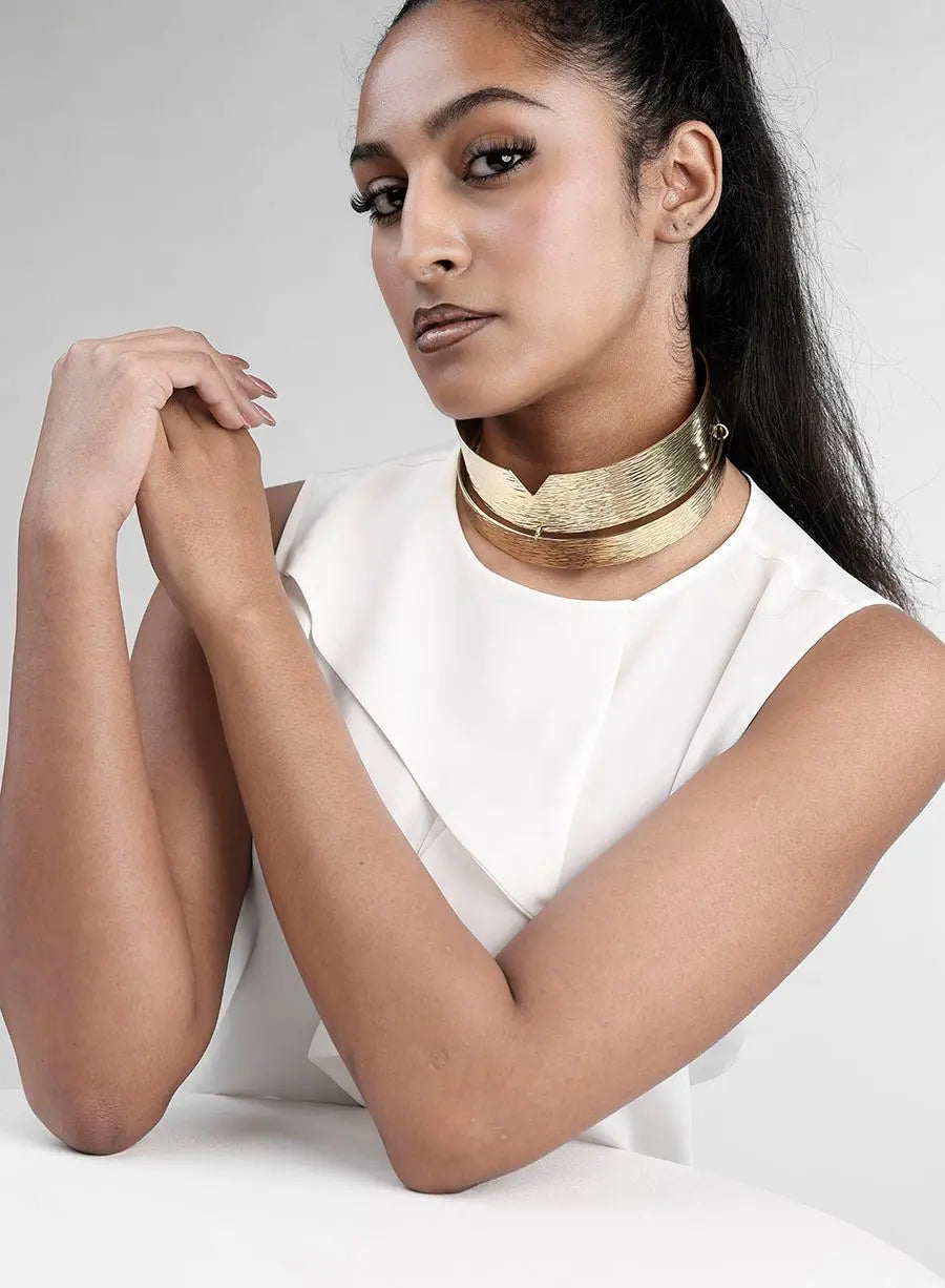 Maki Choker: vibrant gold statement necklace, blending artistry and passion for standout style-on body