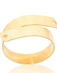 spiral Moraa Spiral Bracelet: flowing, sculpted gold brass bracelet for individuality and gifting | Adele Dejak-front view