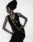 Adele Dejak Aminata Trio Set – a handcrafted trio of gold-tone brass necklaces featuring alternating hammered oval and sleek bar links, available in 88 cm, 127 cm, and 154 cm lengths, offering versatile styling options from bold layering to subtle elegance-model front-view image