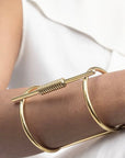 ZEENA Brass Bracelet: bold strength, timeless charm, artisan-crafted for sophisticated style. Perfect for cherished moments and elevated elegance-view on hand