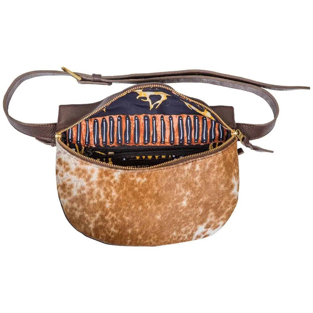 Handmade African inspired adama waist leather bag, brass zip, wax fabric-profile view