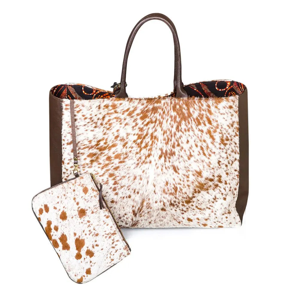 Spacious African wax bag, versatile weekend essential, magnetic closure, chic sophistication, travel-ready-side view