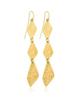 Fativ Brass Earrings: handmade, soulful, and radiant African artistry for statement looks-close up view
