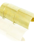 Franziska Extra Bracelet: artisan-made, enchanting, and glowing recycled brass handwear for fashion-forward elegance-overhead view
