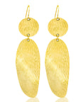 Manica Large Hoop Earrings: luxurious, artisanal gold hoops for confident, standout style-front view