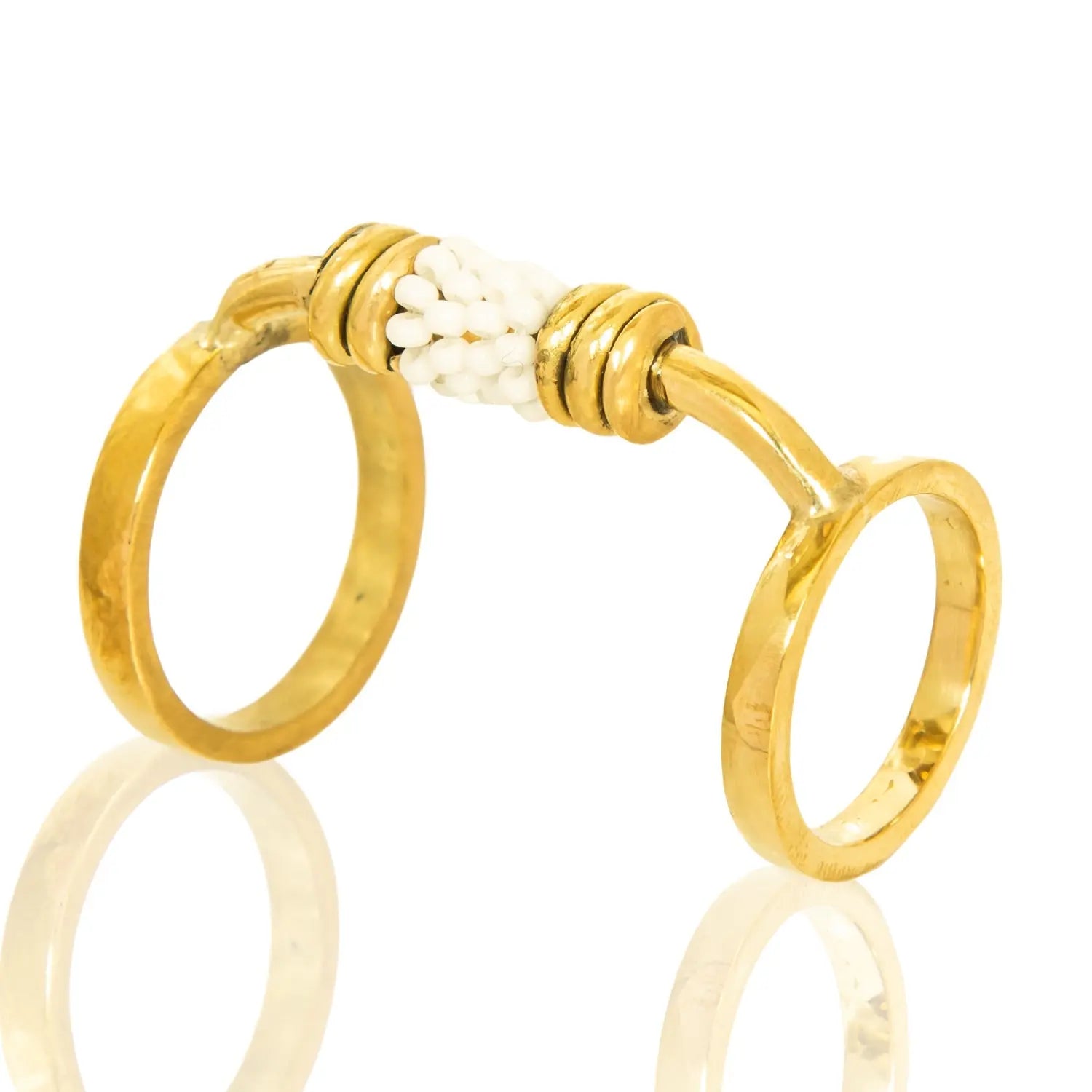 Monifa Beaded Ring: artistic, heartfelt brass ring blending tradition with contemporary allure-diagonal view