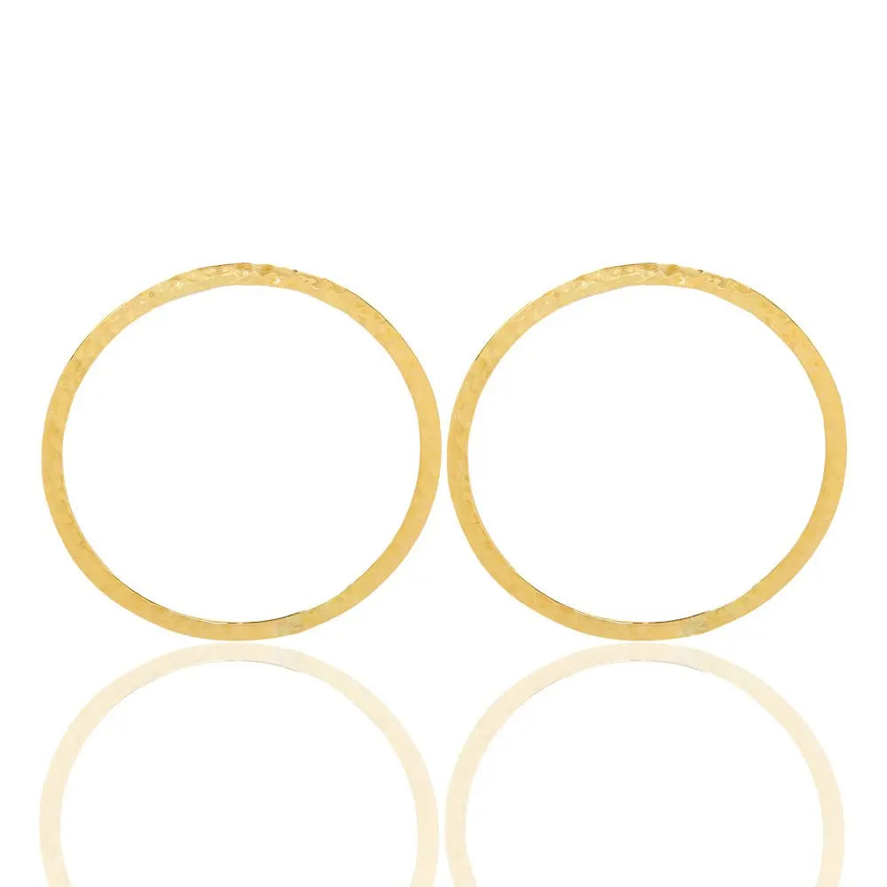 Round zofia brass earrings symbolizing resilience, ideal for birthdays or adding charm to evening outfits-over head view