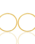 Round zofia brass earrings symbolizing resilience, ideal for birthdays or adding charm to evening outfits-over head view