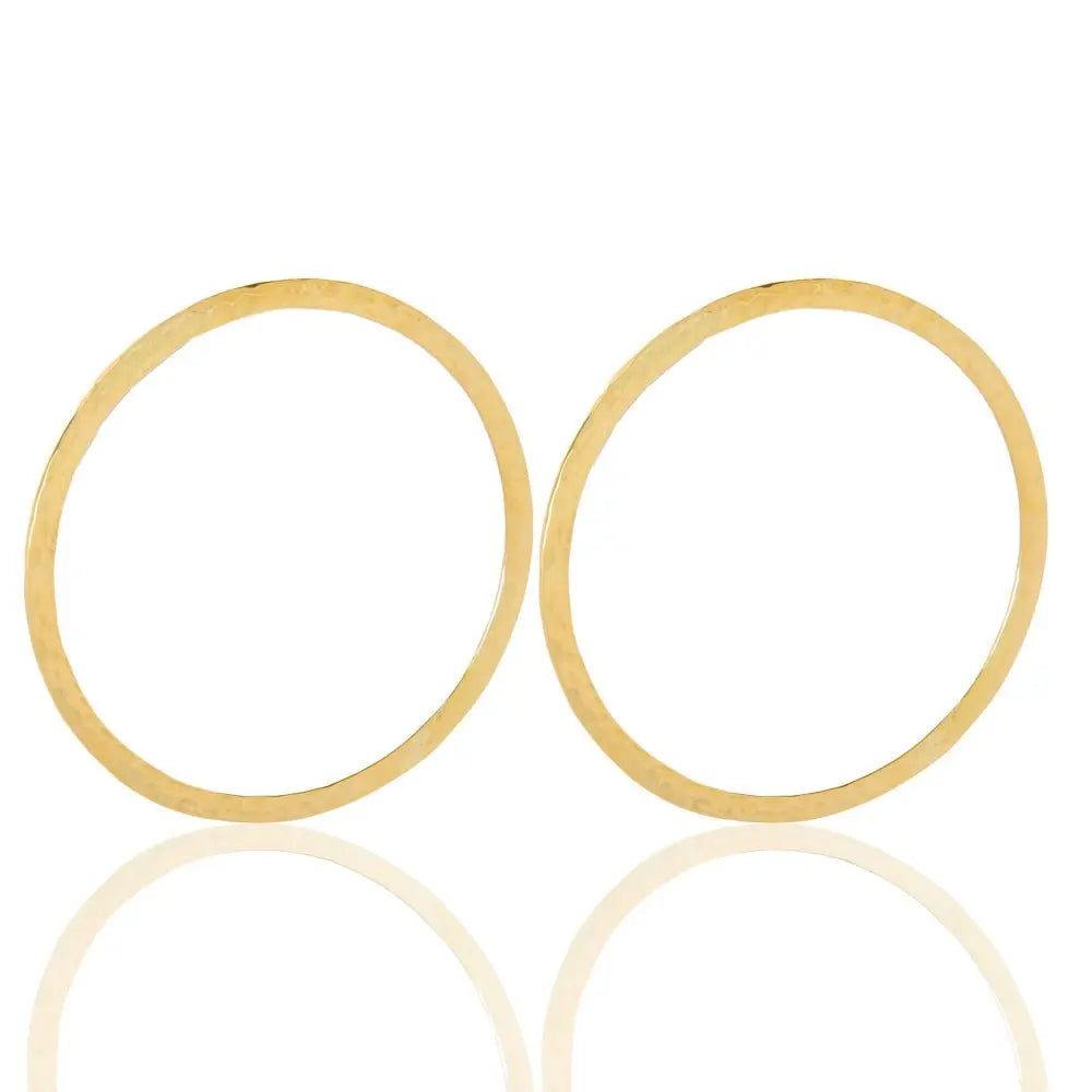 Round zofia brass earrings symbolizing resilience, ideal for birthdays or adding charm to evening outfits-front view