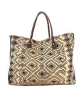 Stylish Bakuba cloth handbag, exotic African design, magnetic closure, Kitenge lining, brass accents, handmade in Kenya, versatile for work or play-side view