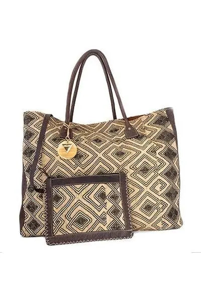 Stylish Bakuba cloth handbag, exotic African design, magnetic closure, Kitenge lining, brass accents, handmade in Kenya, versatile for work or play-unique design