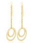 Handcrafted Akili Earrings by Adele Dejak, featuring interlocking circular brass pendants suspended from delicate chain drops; inspired by African heritage, these lightweight, 18.3cm-long statement pieces exude contemporary elegance and timeless sophistication- front  view