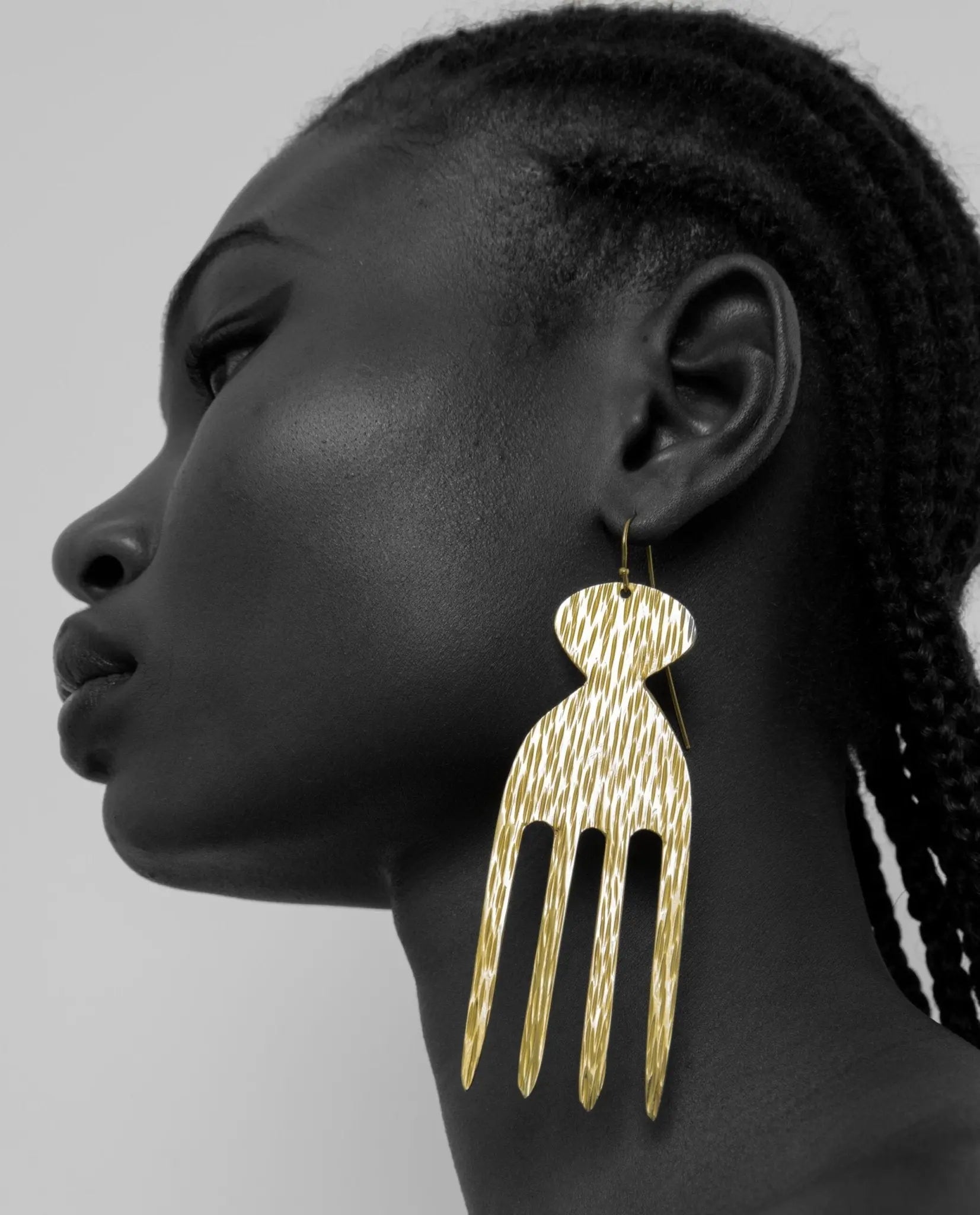 Gold-toned Tiara Afro Comb Earrings, celebrating heritage with artistic flair, perfect for meaningful gifts and standout looks-view on body